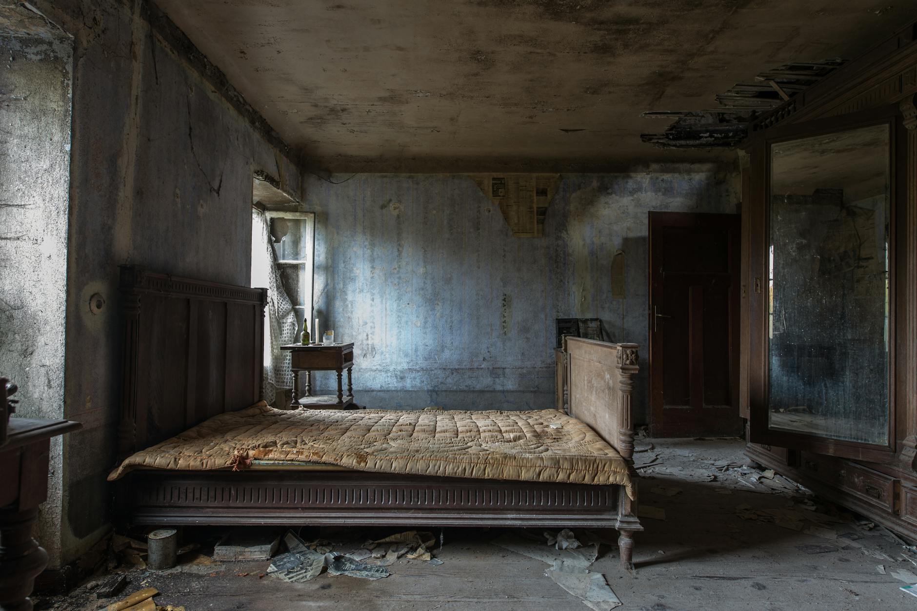 empty damaged room with mattress